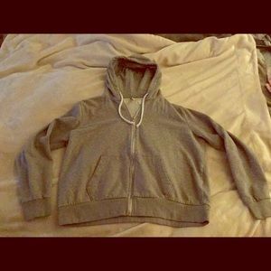 H&M Basic: Divided grey hooded zip up sweater.